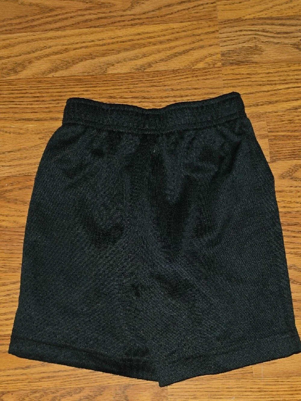 Nike Black Kids' Athletic Shorts with White Swoosh